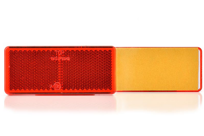 Dispositivo reflectante 96x42 mm trasero con cinta adhesiva